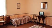 Standard quad with private facilities (bath and shower), and breakfast
